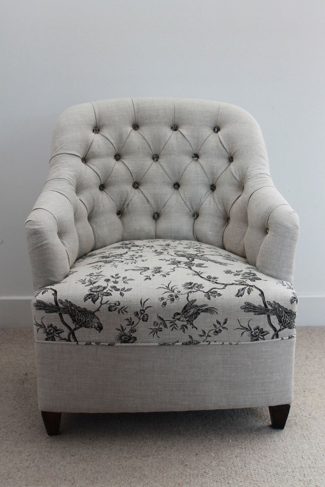 Linen deep buttoned reupholstered chair